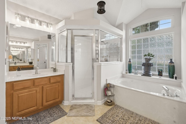 1208 Kyle Way S, Saint Johns, FL 32259 - full bathroom featuring a bath, vanity, a stall shower, tile patterned floors, and lofted ceiling