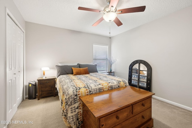 1208 Kyle Way S, Saint Johns, FL 32259 - bedroom with light carpet, a closet, ceiling fan, and a textured ceiling