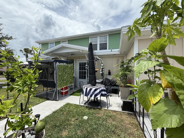 106 Sunrise Ct, Atlantic Beach, FL 32233 - back of property featuring a patio area and a ceiling fan
