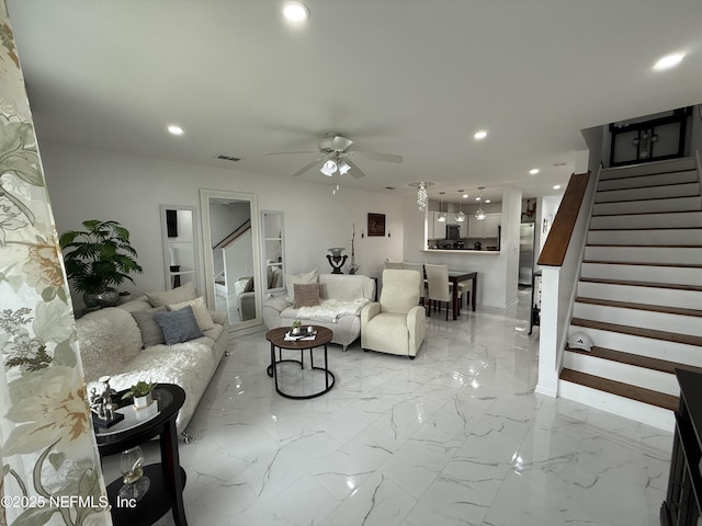106 Sunrise Ct, Atlantic Beach, FL 32233 - living area with stairs, recessed lighting, a ceiling fan, and light marble finish flooring