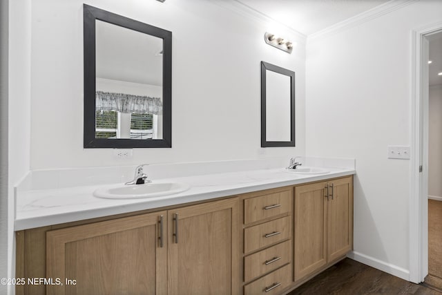 2254 Stauffer Rd, Green Cove Springs, FL 32043 - bathroom with crown molding, double vanity, and wood finished floors