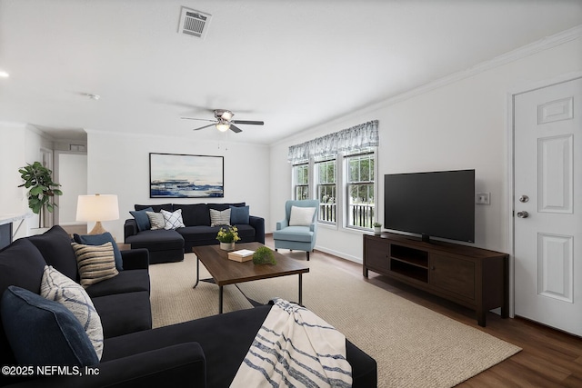 2254 Stauffer Rd, Green Cove Springs, FL 32043 - living room featuring wood finished floors, ornamental molding, and ceiling fan