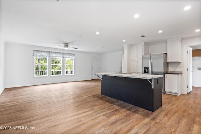 2254 Stauffer Rd, Green Cove Springs, FL 32043 - kitchen featuring crown molding, stainless steel refrigerator with ice dispenser, white cabinets, recessed lighting, and a ceiling fan