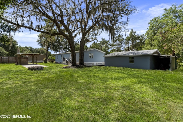 2254 Stauffer Rd, Green Cove Springs, FL 32043 - view of yard featuring an outdoor fire pit