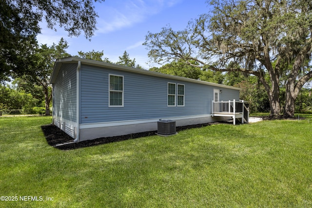 2254 Stauffer Rd, Green Cove Springs, FL 32043 - view of home's exterior with a yard and a deck