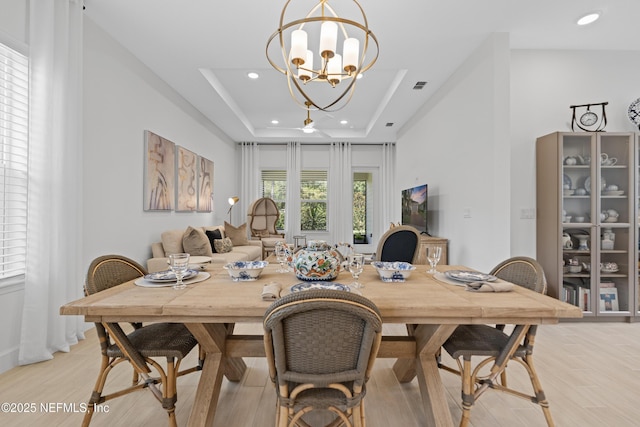 985 Rustic Mill Dr, Saint Augustine, FL 32092 - dining area with a raised ceiling, a chandelier, light wood-style floors, and recessed lighting