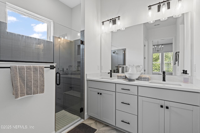 985 Rustic Mill Dr, Saint Augustine, FL 32092 - full bathroom featuring double vanity, a shower stall, and marble finish floors
