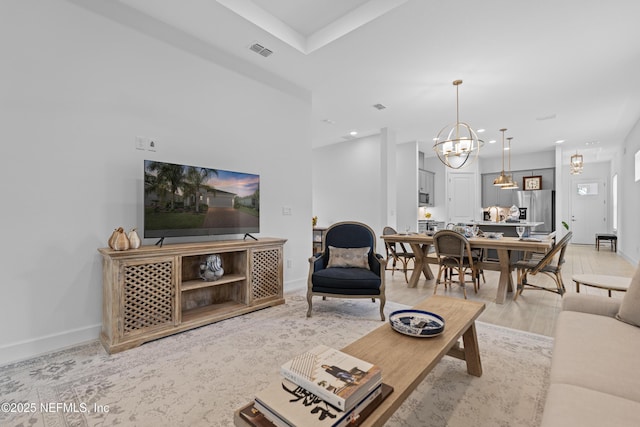 985 Rustic Mill Dr, Saint Augustine, FL 32092 - living room featuring a chandelier, light wood-style floors, and recessed lighting