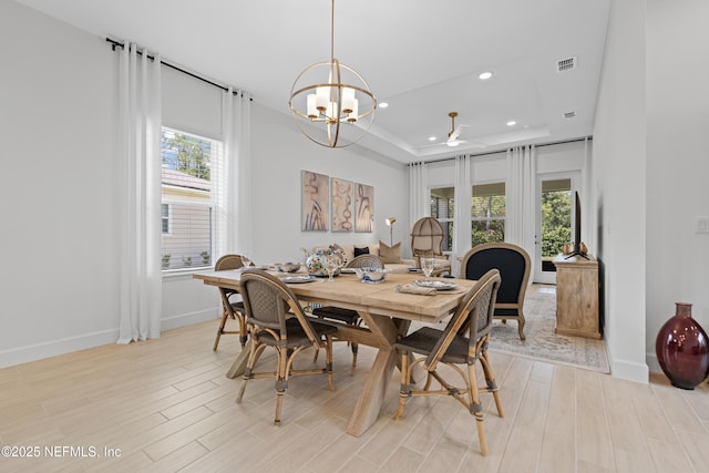 985 Rustic Mill Dr, Saint Augustine, FL 32092 - dining area with a raised ceiling, healthy amount of natural light, a chandelier, light wood-style flooring, and recessed lighting