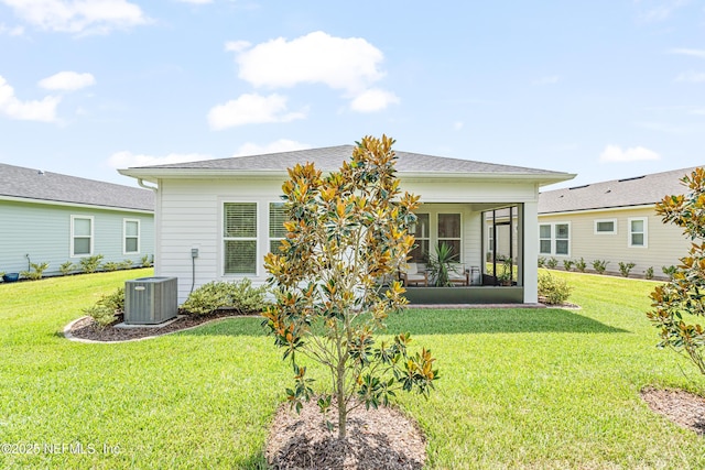 985 Rustic Mill Dr, Saint Augustine, FL 32092 - back of house featuring a sunroom and a lawn