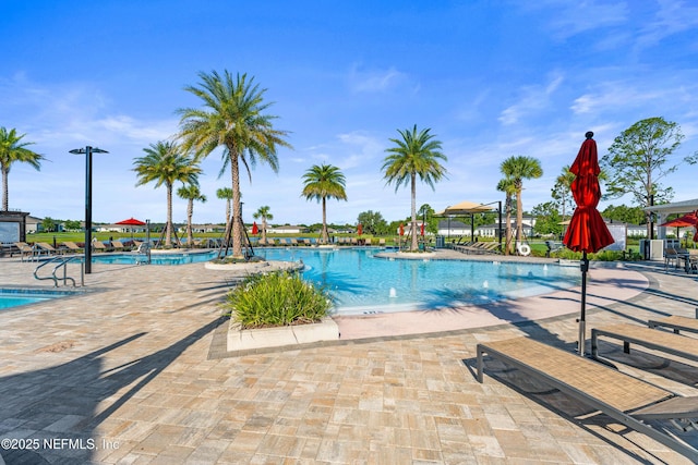 985 Rustic Mill Dr, Saint Augustine, FL 32092 - community pool featuring a patio area