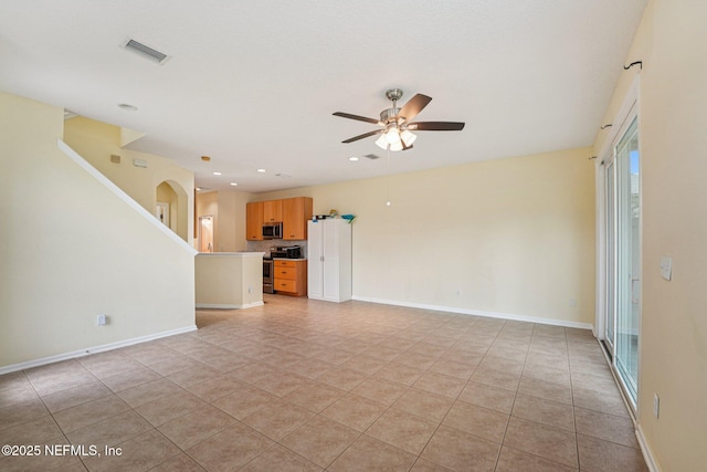 3905 Buckthorne Dr Unit D, Orange Park, FL 32065 - unfurnished living room with ceiling fan, light tile patterned floors, and recessed lighting