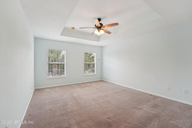 3905 Buckthorne Dr Unit D, Orange Park, FL 32065 - carpeted spare room featuring a ceiling fan and a tray ceiling