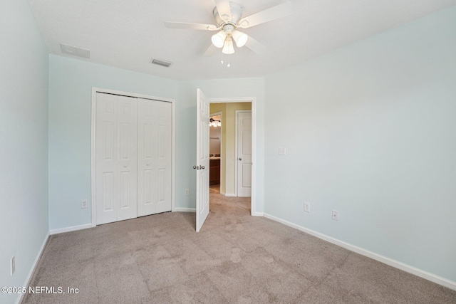 3905 Buckthorne Dr Unit D, Orange Park, FL 32065 - unfurnished bedroom with carpet, a closet, and ceiling fan