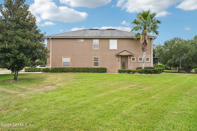 3905 Buckthorne Dr Unit D, Orange Park, FL 32065 - back of house with a yard and stucco siding