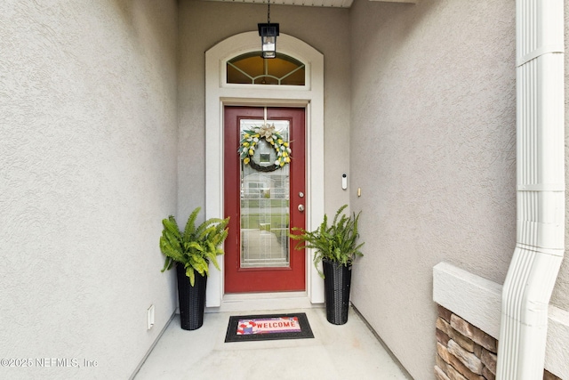 95212 Tanglewood Dr, Fernandina Beach, FL 32034 - entrance to property featuring stucco siding