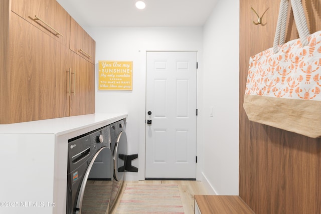 411 S St, Neptune Beach, FL 32266 - laundry room with washer and dryer, light wood-style floors, recessed lighting, and cabinet space