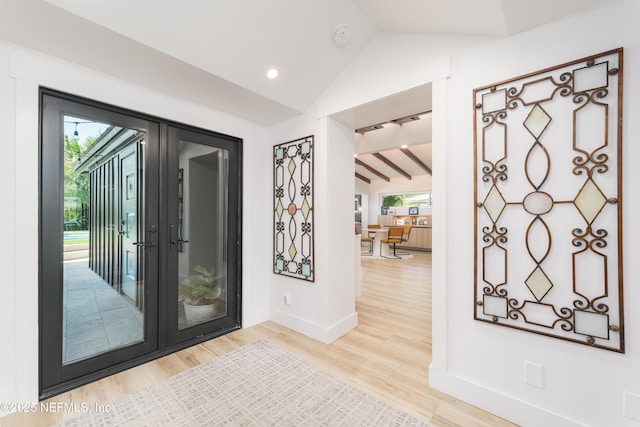 411 S St, Neptune Beach, FL 32266 - entrance foyer featuring vaulted ceiling, light wood-type flooring, french doors, and recessed lighting