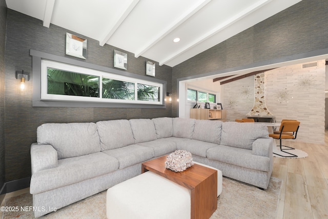411 S St, Neptune Beach, FL 32266 - living room with light wood-type flooring and wallpapered walls