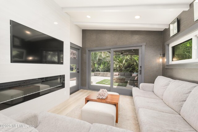 411 S St, Neptune Beach, FL 32266 - living room featuring wood finished floors, beam ceiling, and recessed lighting