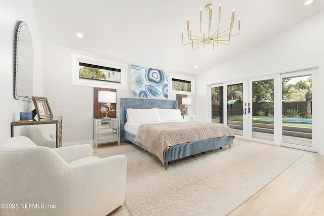 411 S St, Neptune Beach, FL 32266 - bedroom featuring access to outside, a chandelier, vaulted ceiling, recessed lighting, and wood finished floors