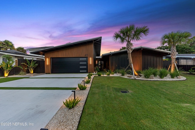 411 S St, Neptune Beach, FL 32266 - mid-century inspired home featuring concrete driveway and a garage
