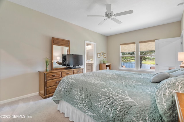 71 Ash Breeze Cv, Saint Augustine, FL 32095 - bedroom featuring light colored carpet, ensuite bathroom, and ceiling fan
