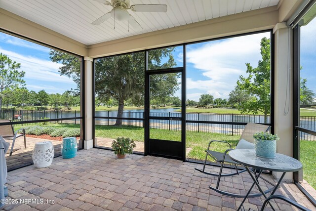 71 Ash Breeze Cv, Saint Augustine, FL 32095 - sunroom with ceiling fan, a water view, and healthy amount of natural light