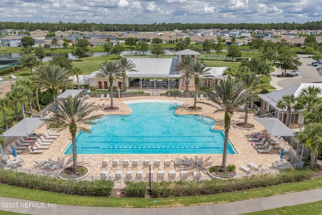 71 Ash Breeze Cv, Saint Augustine, FL 32095 - community pool featuring a residential view