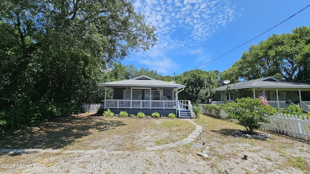 1319 Hickory St, Fernandina Beach, FL 32034 - view of front of property with a porch and a sunroom