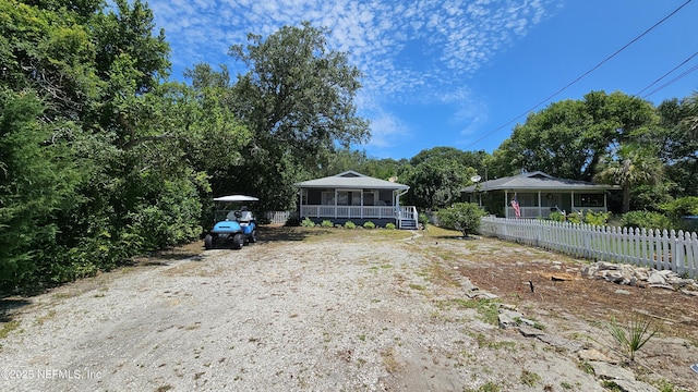 1319 Hickory St, Fernandina Beach, FL 32034 - view of yard with a sunroom