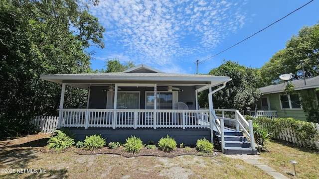 1319 Hickory St, Fernandina Beach, FL 32034 - view of front facade featuring a ceiling fan and a porch