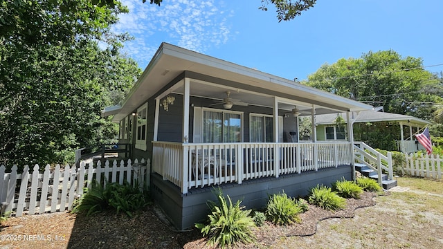 1319 Hickory St, Fernandina Beach, FL 32034 - manufactured / mobile home with ceiling fan and a porch