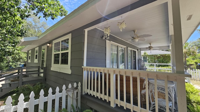1319 Hickory St, Fernandina Beach, FL 32034 - view of home's exterior featuring a ceiling fan and a porch