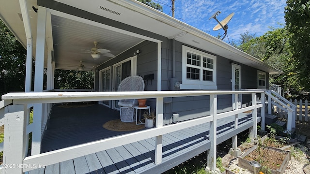 1319 Hickory St, Fernandina Beach, FL 32034 - view of side of home with a deck and a ceiling fan