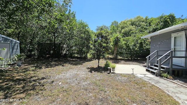 1319 Hickory St, Fernandina Beach, FL 32034 - view of yard featuring a patio area