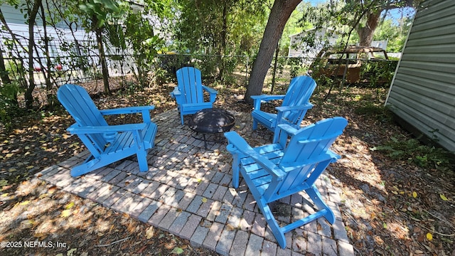 1319 Hickory St, Fernandina Beach, FL 32034 - view of patio / terrace with an outdoor fire pit