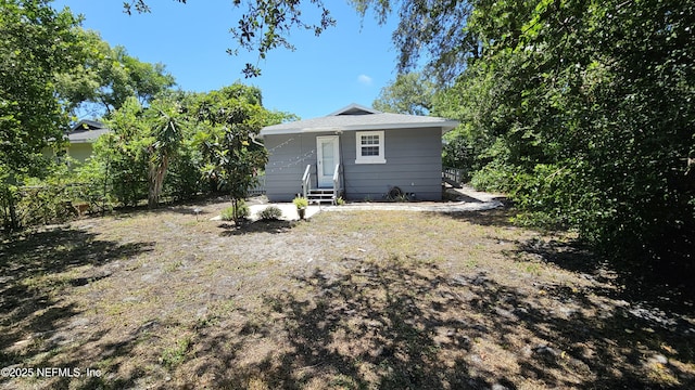1319 Hickory St, Fernandina Beach, FL 32034 - back of house featuring entry steps