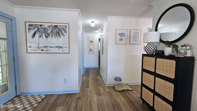1319 Hickory St, Fernandina Beach, FL 32034 - hallway with ornamental molding and wood finished floors