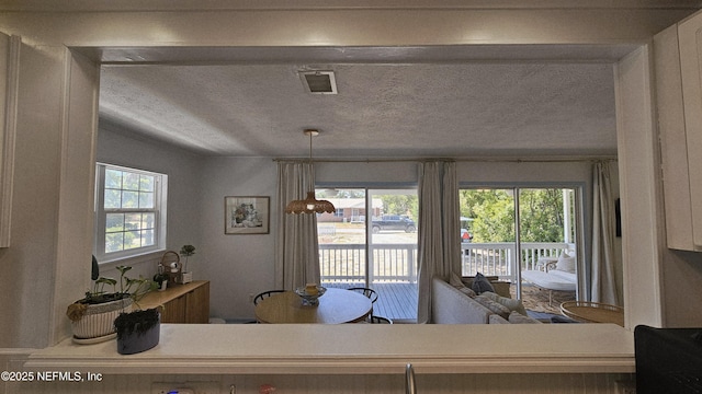 1319 Hickory St, Fernandina Beach, FL 32034 - kitchen featuring a textured ceiling
