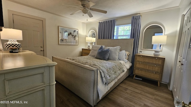 1319 Hickory St, Fernandina Beach, FL 32034 - bedroom with dark wood-style floors, ornamental molding, and a ceiling fan