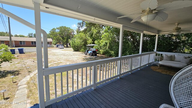 1319 Hickory St, Fernandina Beach, FL 32034 - wooden terrace featuring ceiling fan