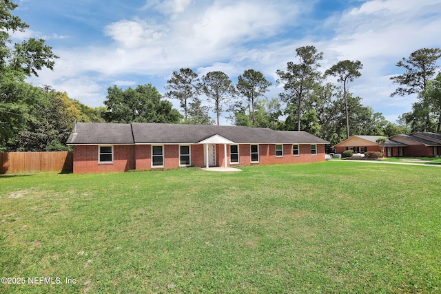 11707 Village Ln, Jacksonville, FL 32223 - single story home featuring brick siding and a carport