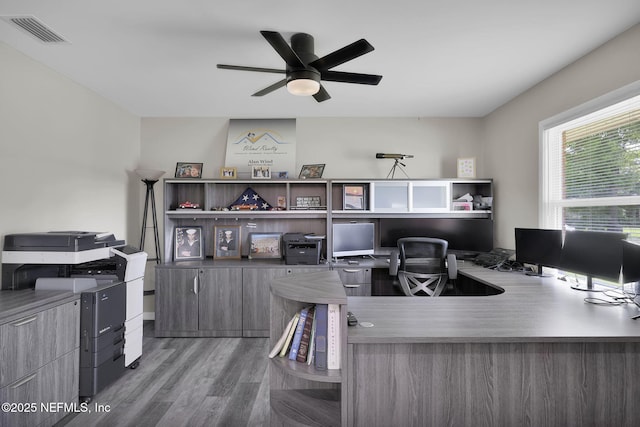 11707 Village Ln, Jacksonville, FL 32223 - home office featuring wood finished floors and a ceiling fan