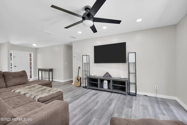 11707 Village Ln, Jacksonville, FL 32223 - living area with a ceiling fan, wood finished floors, and recessed lighting