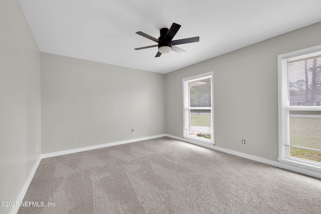 11707 Village Ln, Jacksonville, FL 32223 - carpeted empty room with baseboards and ceiling fan
