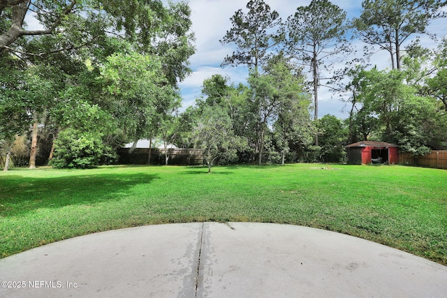 11707 Village Ln, Jacksonville, FL 32223 - view of yard featuring a patio