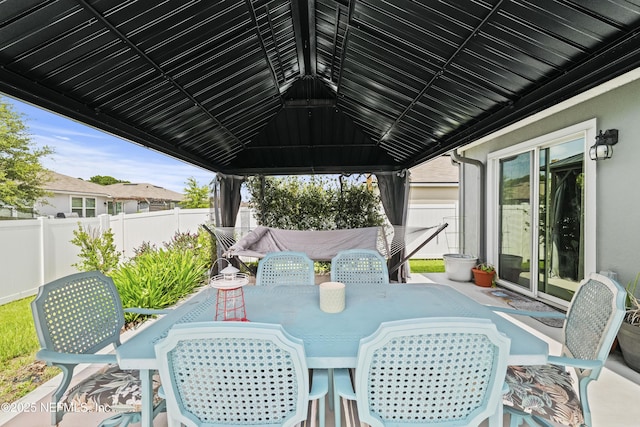 2264 Pebble Point Dr, Green Cove Springs, FL 32043 - fenced backyard featuring a gazebo, outdoor dining space, and a patio
