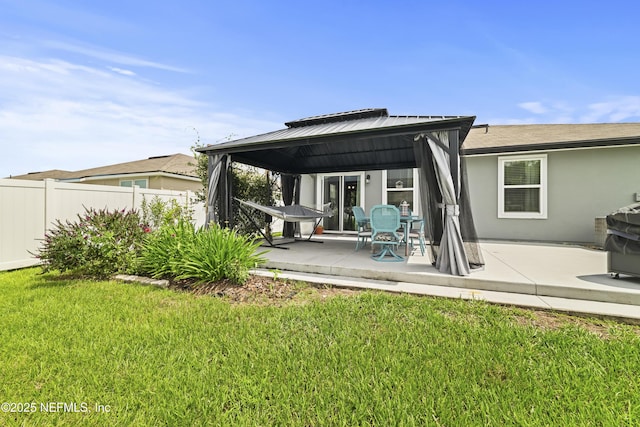 2264 Pebble Point Dr, Green Cove Springs, FL 32043 - rear view of property featuring a gazebo, a patio area, and stucco siding