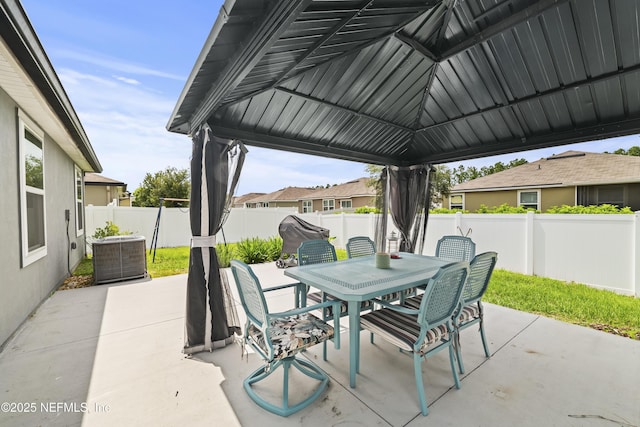 2264 Pebble Point Dr, Green Cove Springs, FL 32043 - fenced backyard with outdoor dining space, a patio area, and a gazebo